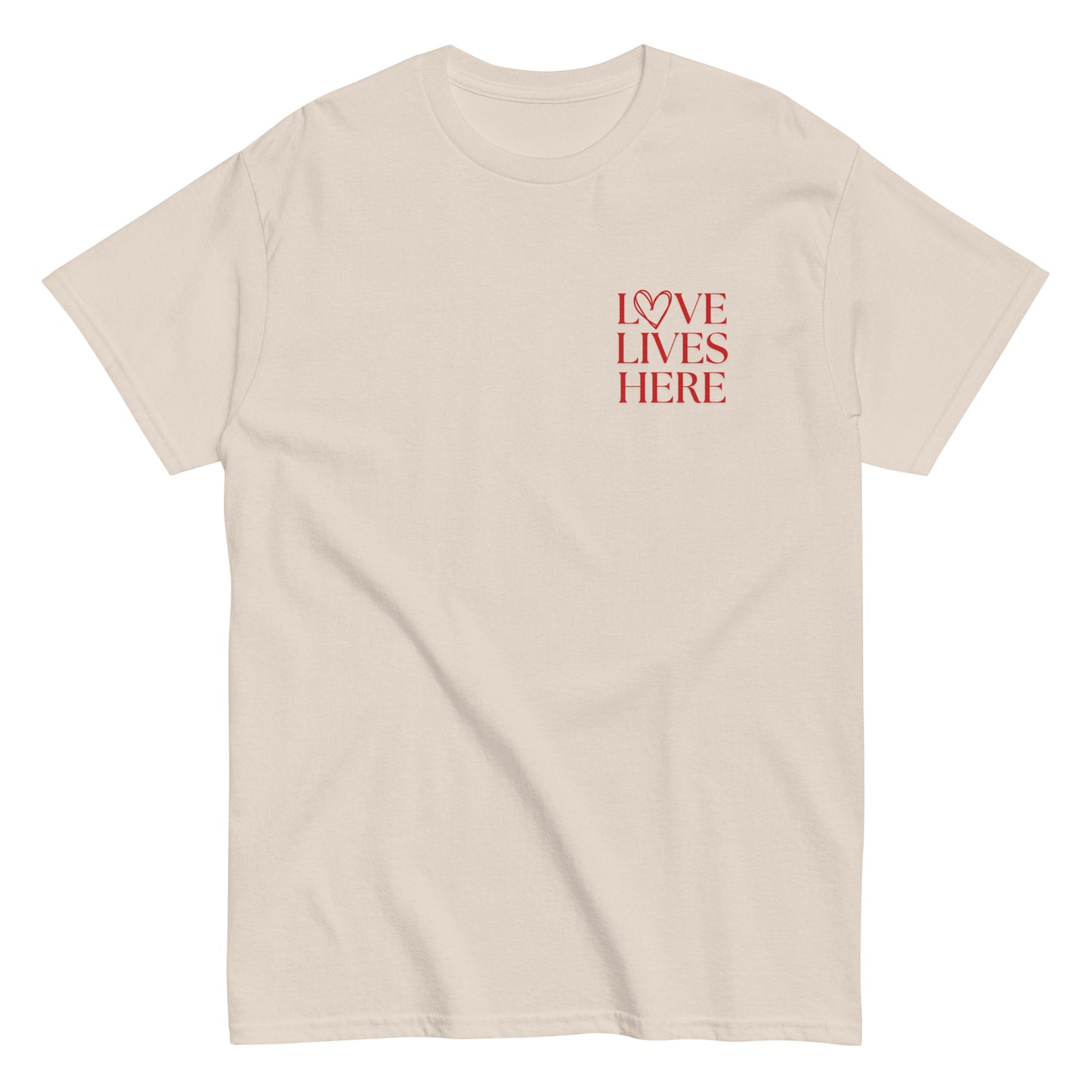 Love Lives Here T-Shirt in tan with red lettering, a cozy and stylish tee symbolizing love, kindness, and positivity."