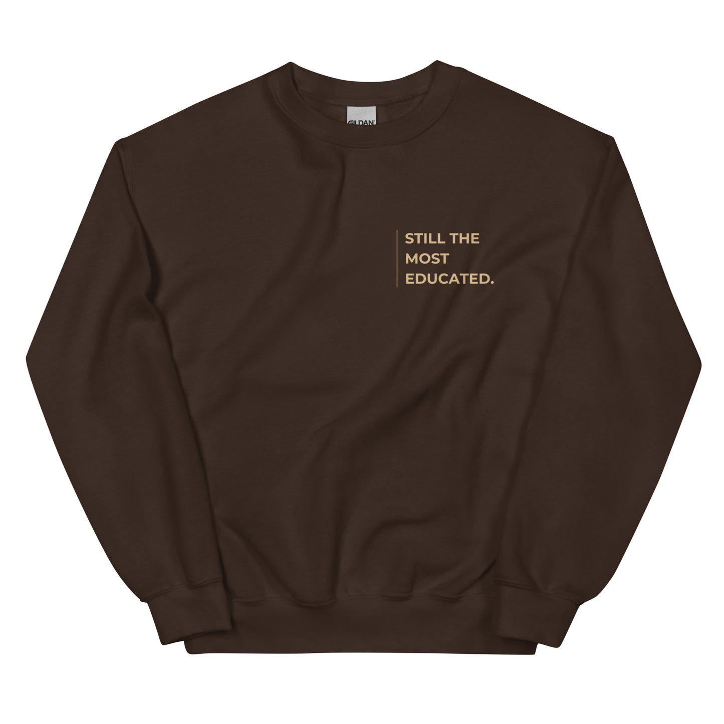 Still the Most Educated Sweatshirt in brown with beige lettering, a warm and cozy pullover designed for intellectuals and trailblazers