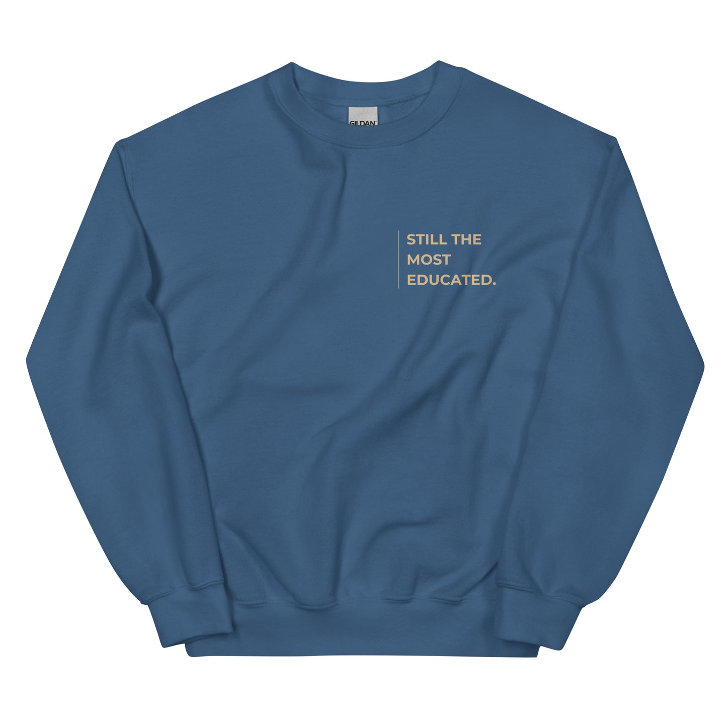 Still the Most Educated Sweatshirt in indigo blue with beige lettering, a deep and stylish pullover symbolizing knowledge, success, and determination.