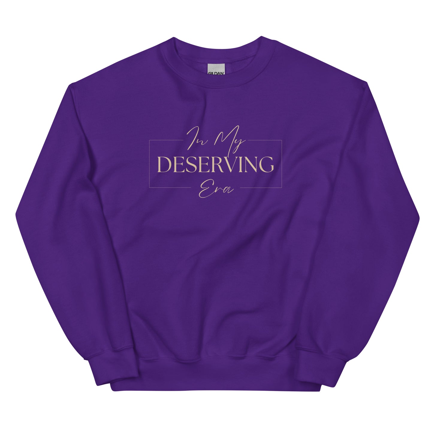 In My Deserving Era Sweatshirt in deep purple with beige lettering, an empowering and cozy piece for self-worth and prosperity.