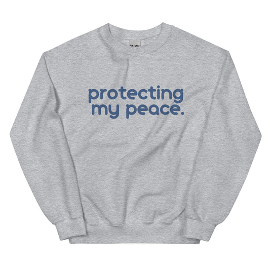 Protecting My Peace Sweatshirt in grey with blue lettering, an empowering pullover for those committed to protecting their energy.